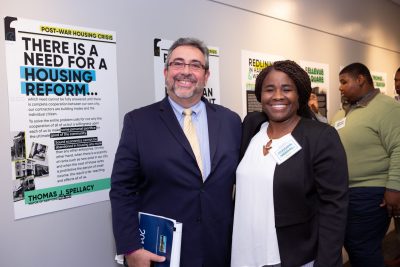 Fernando Betancourt, Executive Director of the San Juan Center Inc., a Latino nonprofit agency in Hartford, and Fiona Vernal at the opening of EPOCH's Housing Discrimination exhibition in 2019 (photo courtesy of Defining Studios)
